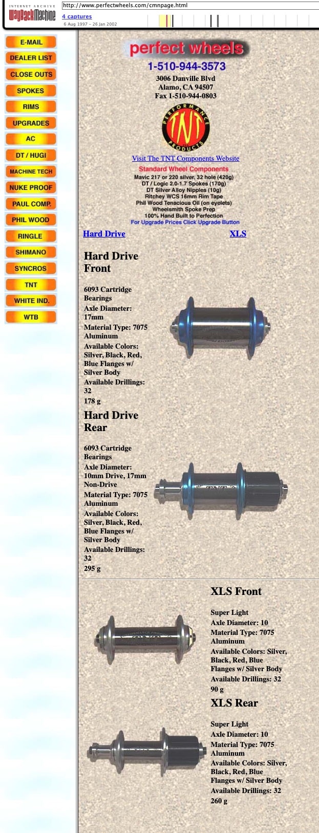 Archived perfectwheels.com TNT Components catalog page from 1997: Hard Drive and XLS hubs in four anodized colors with gram weights